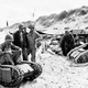 US Navy men in France disassemble Nazi “beetles” that were armed with explosives on June 19, 1944 (Associated Press)